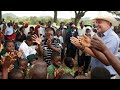 Celebration in Zimbabwe as a white farmer returns to seized land