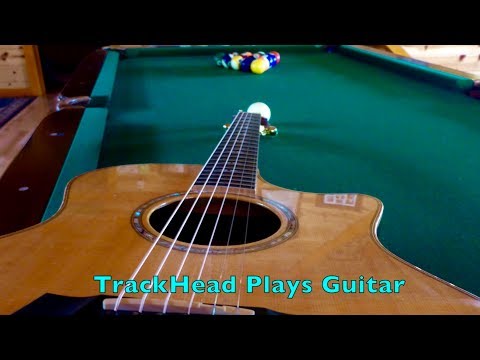 TrackHead Plays Guitar