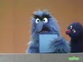 Sesame Street Herry Looks For Triangles