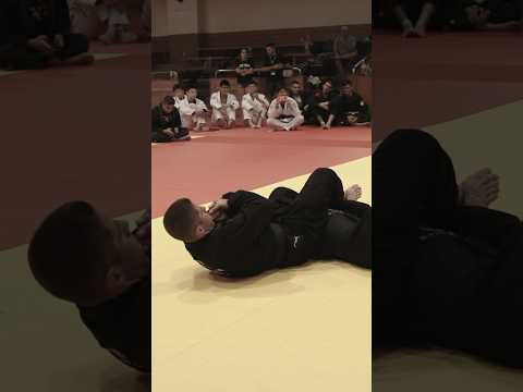 Omoplata to Armbar sequence by Tainan Dalpra in Japan