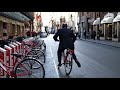 Man In A Suit Riding A Bicycle In Rome Italy