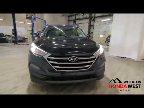 2018 Hyundai Tucson 2.0L SE AWD in Black for sale at Wheaton Honda West in Calgary, AB