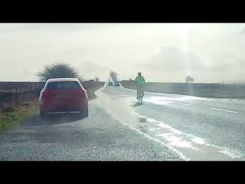 cyclist almost gets clattered