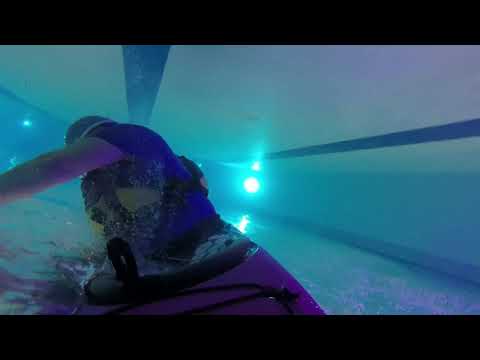 Rolling a kayak with a sculling brace