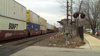 preview picture of video 'BNSF with a Warbonnet at crossing  With Cool Horn'