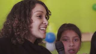 Gaby Moreno sings 'Fronteras' with students at a Guatemala Literacy Project school