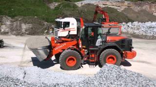 preview picture of video 'Hitachi ZW220-5 wheel loader and ZX290LC-5 excavator in Norway'