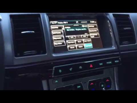 Overview of 2015 Jaguar XF 3.0 AWD Portfolio Rhodium Silver with Charcoal interior