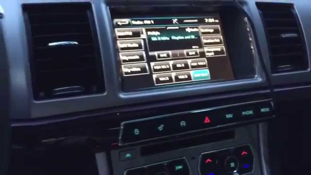 Overview of 2015 Jaguar XF 3.0 AWD Portfolio Rhodium Silver with Charcoal interior