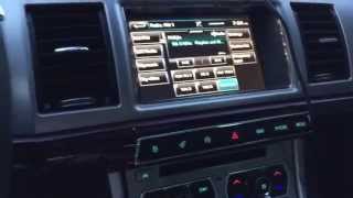 Overview of 2015 Jaguar XF 3.0 AWD Portfolio Rhodium Silver with Charcoal interior