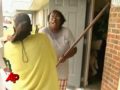 Raw Video: Woman Attacks TV Crew With Hoe