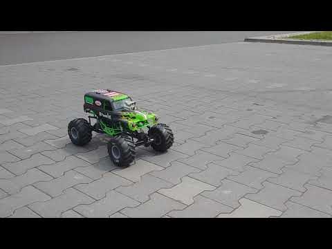 Maverick Strada E30 RC and Axial Grave Digger drift on parking lot