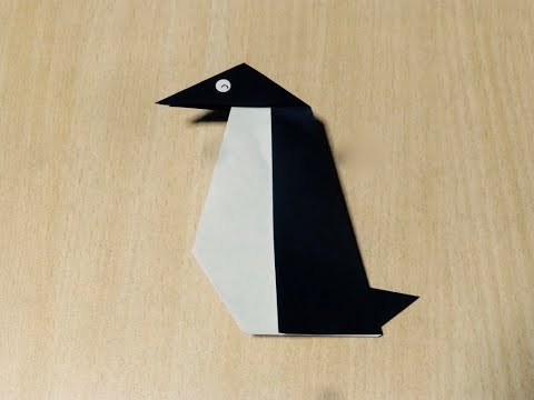 How to make Penguin. Origami. The art of folding paper.