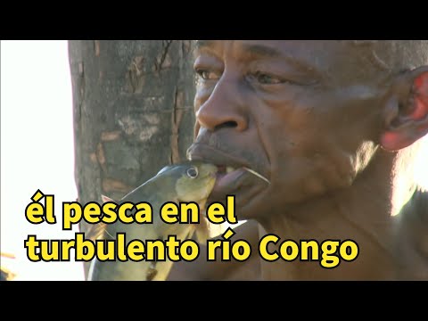 él pesca en el turbulento río Congo, mantiene a tres esposas y trece hijos