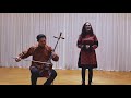 Ugalz band. Mongolian traditional long song performed by singer Badamhand and morin khuur Batzaya