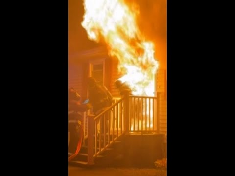 Firefighter engulfed in flames while battling house fire