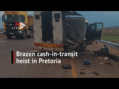 Onlookers flock to scene of a brazen cash-in-transit heist