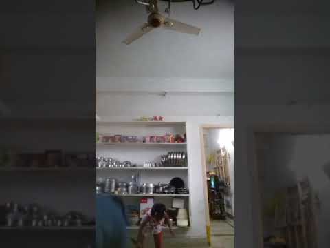 Kushi learning and practicing badminton.