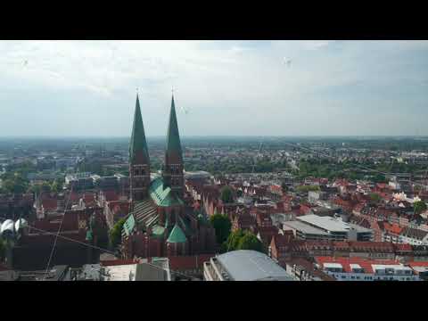 Aerial view of old town. Orbiting around Marienkirche, main parish church. Brick gothic religious