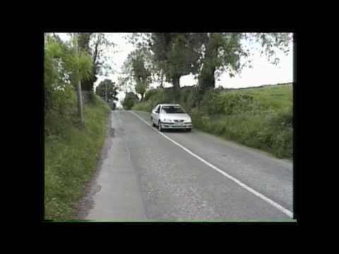 Car rolling up hill in Louth.wmv