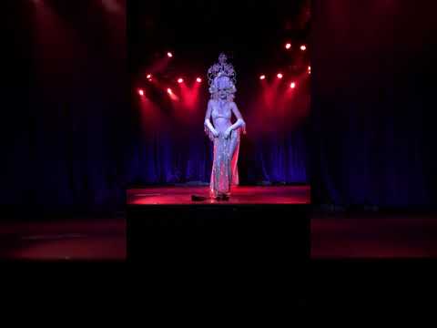 Natasha Riot (Izabelle Starling) fire fans at Sinferno Cabaret