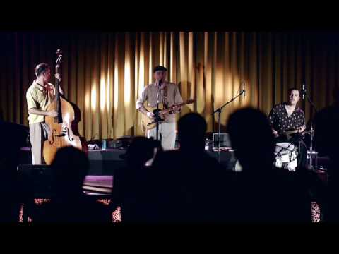 John Guster & The Rhythm Storms - Young & Wild