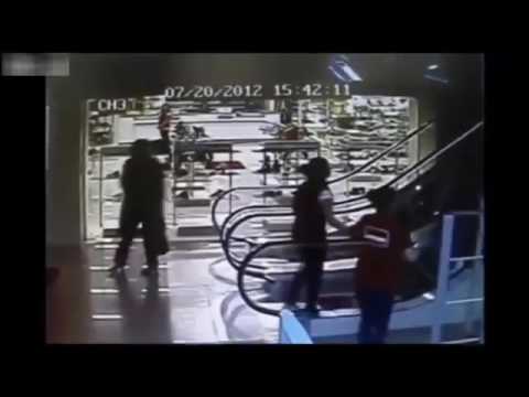 Old Woman Gets Stuck On Escalator Rail