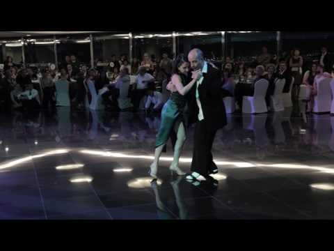  Horacio Godoy  and  Cecilia Berra  are  dancing  to  "  La caída de la estantería  "  by  Edgardo Donato  at  Dubai Tango Festival  in  2015