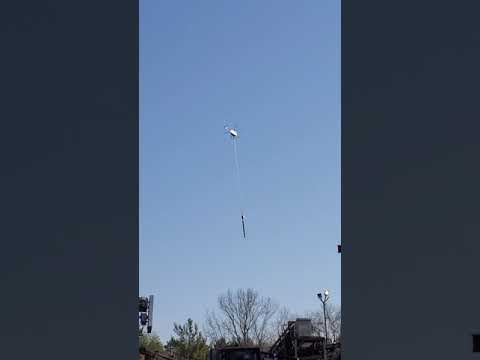 these pilots have giant watermelon testicles! Above our shop/ chainsaw dangling from helicopter 🚁🥎's