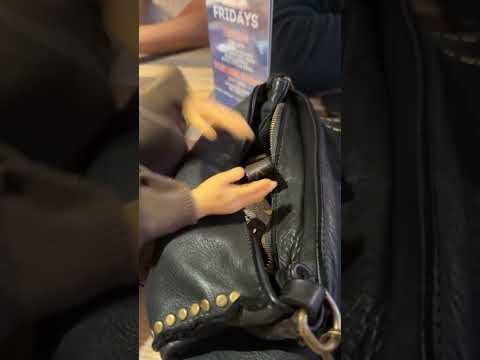 Caught Elisheva digging through my purse 😳