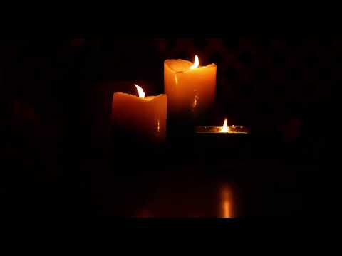 3 flickering candles burning for 1 hour in the dark