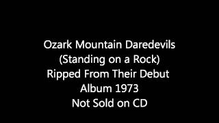 Ozark Mountain Daredevils ( Standing on a Rock)