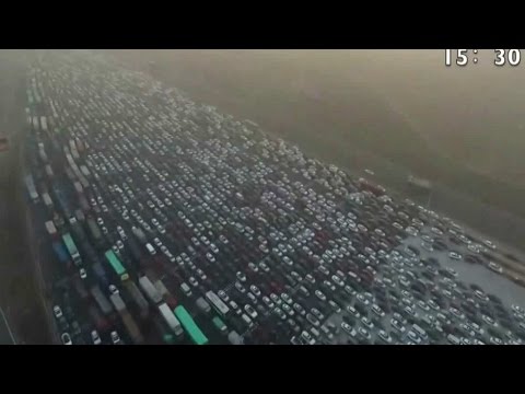 Watch the incredible footage of a 50-lane holiday traffic jam in China