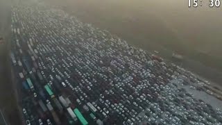 Watch the incredible footage of a 50-lane holiday traffic jam in China