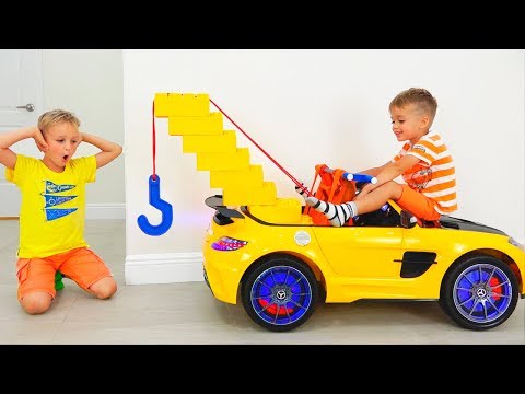 Vlad and Nikita play with Toy Tow Truck for children