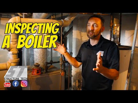 Inspecting a boiler during a home inspection