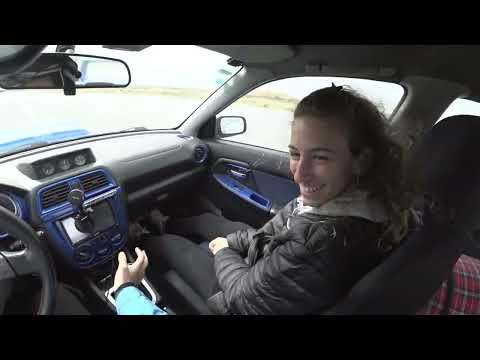 Subaru STi 2004 on wet racing Track