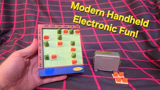 Modern Electronic Handheld, Camp Guru by Giiker