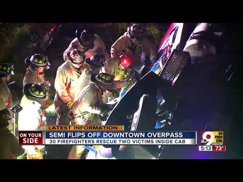 Semi rolls off overpass, badly injuring driver