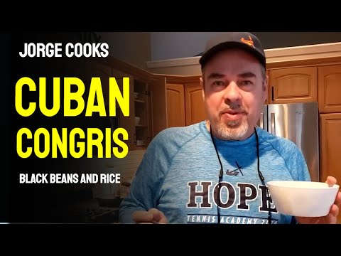 Jorge cooks Cuban Congris (black beans and rice)
