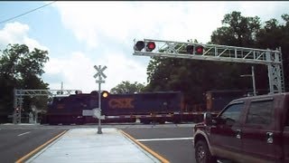 preview picture of video 'CSX Freight Train Through New Railroad Crossing'