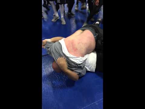 Hebron High School's Football Head Coach Wrestles Student, Making Him Tap Out