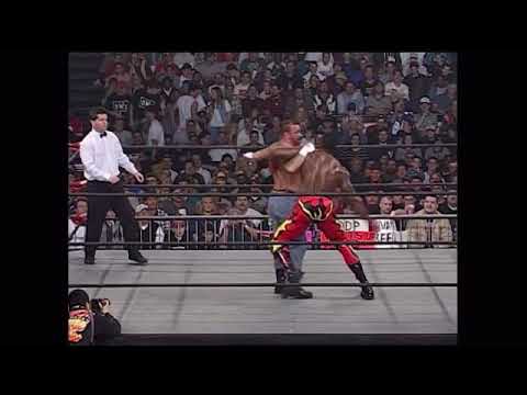 Booker T - Arm-Caught Kneeling Clothesline