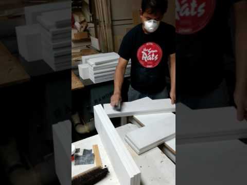 Sanding primer coat on drawer faces