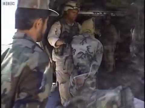 American Military Prisoners Being Hooded for Transport