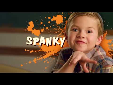 Official trailer thumbnail: the modern Little Rascals sprint past a bakery storefront, bright daytime palette