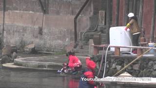 changing way of cloth washing  old town Fenghuang Hunan China