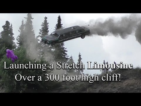 Launching a stretch limo over a 300 foot high cliff! In car video footage!!