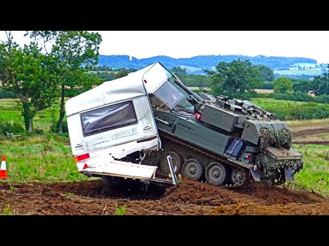 CVRT Scorpion Light Tank Demolishing a Caravan