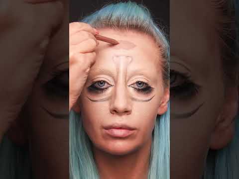 She is drawing an upside-down face! 🤯 #shorts